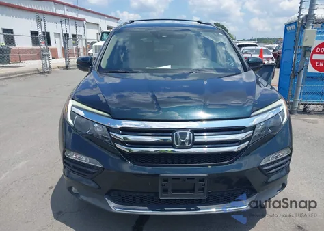 2016 Honda Pilot Elite z USA, uszkodzony, nr VIN 5FNYF6H01GB044741